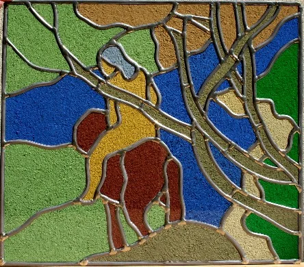Vitrail figuratif représentant un cavalier dans un paysage coloré
